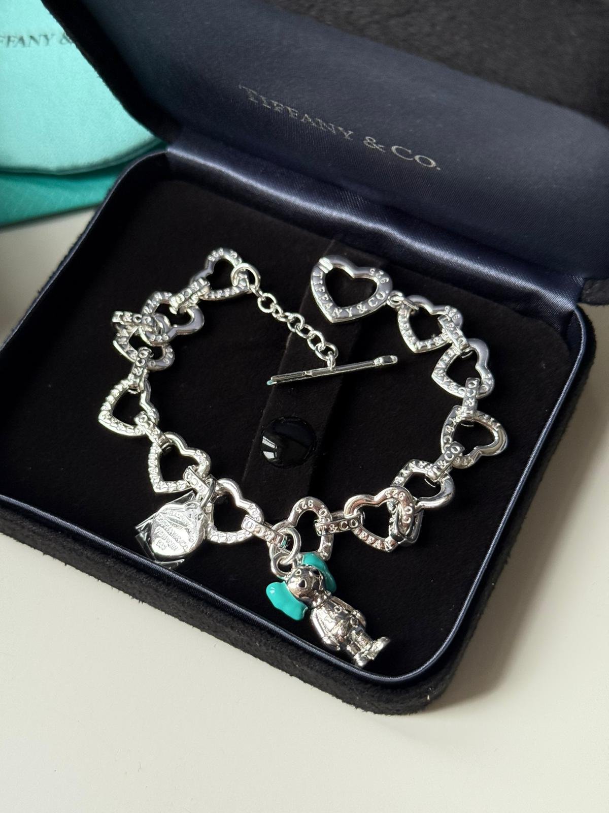Adjustable heart shaped chain and silver doll charm bracelet in 925 silver can be worn by both men and women.
