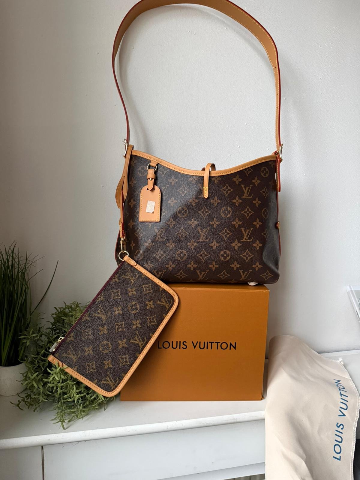 Premium Quality Carryall PM shoulder bag made from monogram canvas.