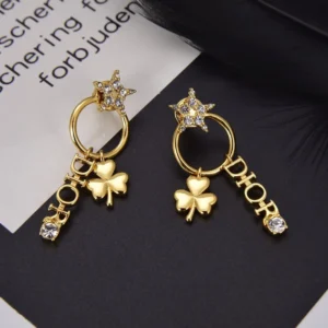 Alternative view of Drop earrings with D!0r letter and diamond inlaid charms.