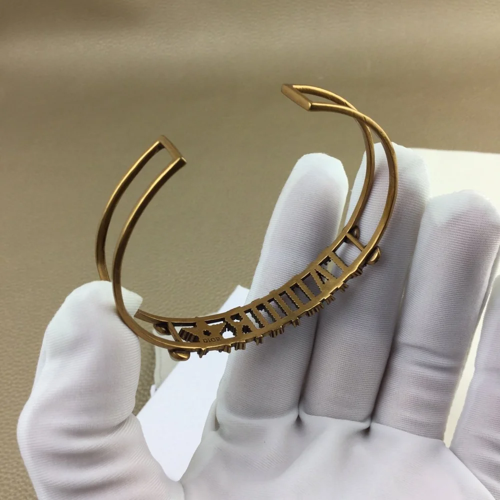 Gold bracelet/Bangle with J@D!0R cut out and pearls. - Image 5