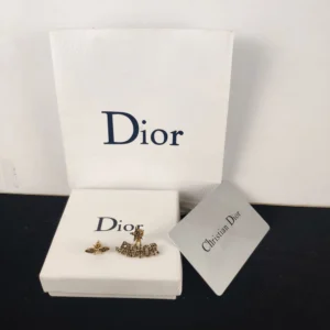 Diamonds inlaid Bee Stud earrings and J@D!OR cut out.