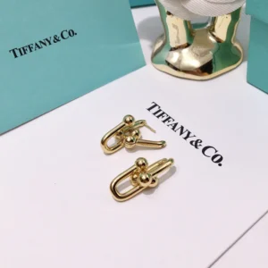 Alternative view of City HardWear earrings,industrial-inspired link design.