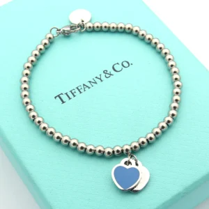Sterling silver bead bracelet with heart-shaped charm in Blue/Tiffnay blue/Pink enamel.