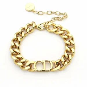 Linked chain gold bracelet with CD cutout.