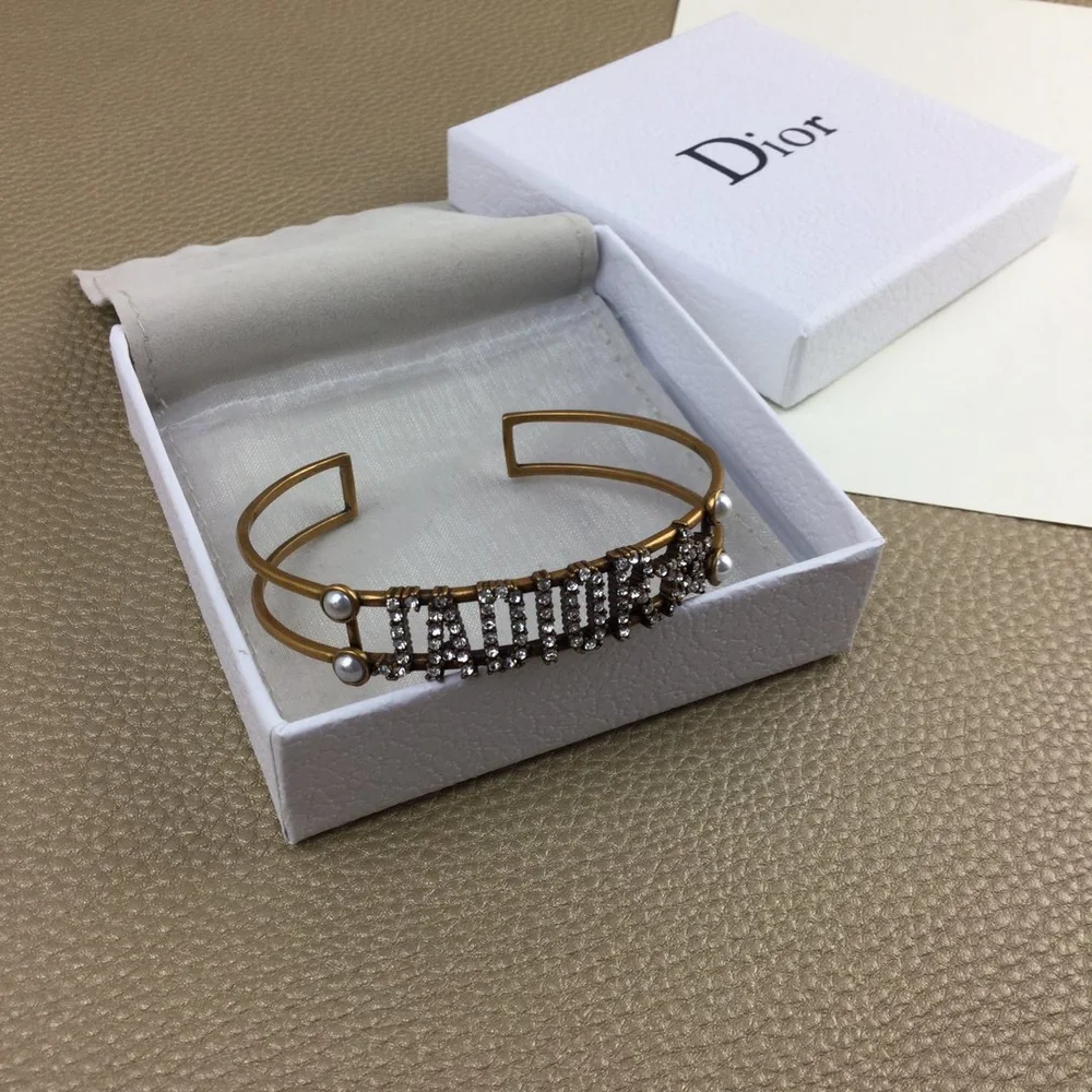 Gold bracelet/Bangle with J@D!0R cut out and pearls. - Image 3