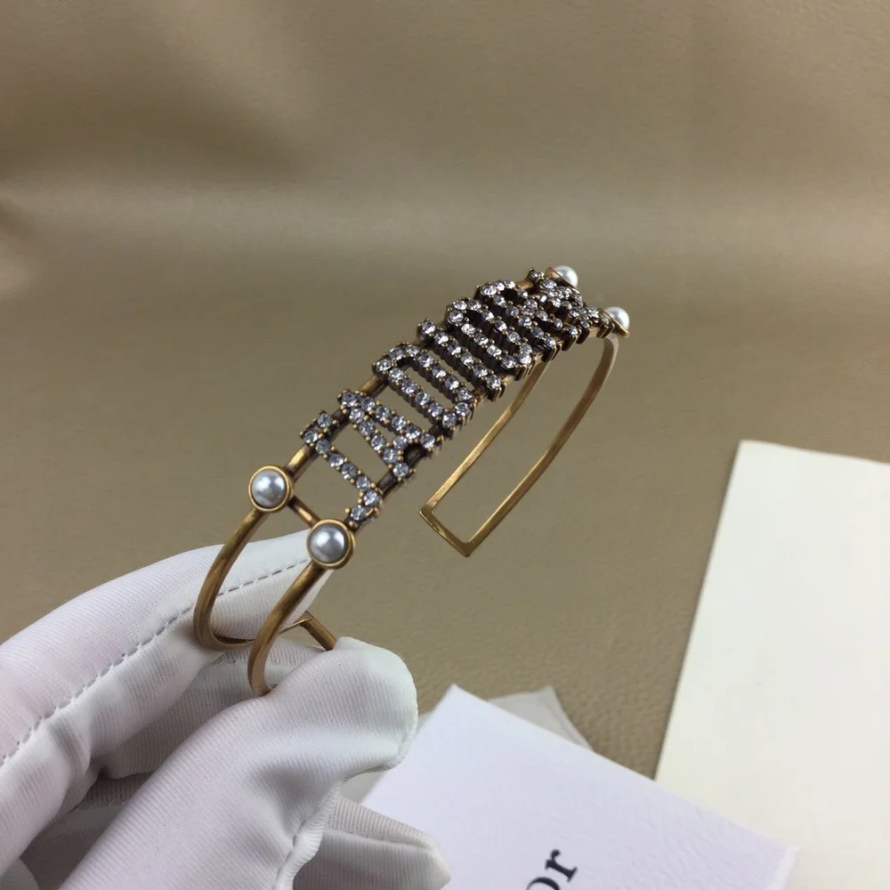 Gold bracelet/Bangle with J@D!0R cut out and pearls. - Image 4