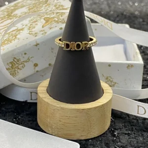 Alternative view of Silver /Gold ring with diamonds and brand name engraved.