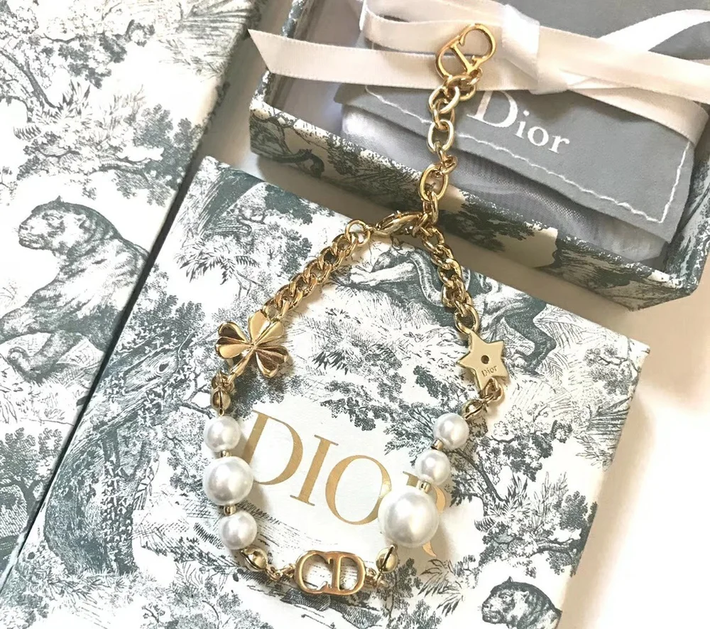 Linked chain gold Bracelet with CD cutout, clover leaf motif and white pearls. - Image 3