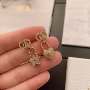 Alternative view of Star and heart shaped trendy Stud earrings with diamonds inlaid.