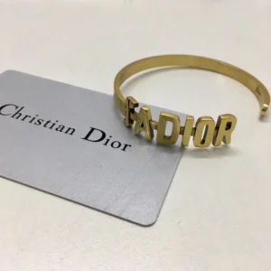 Alternative view of Gold bracelet/Bangle with J@D!0R cut out.