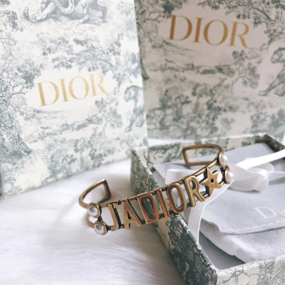 Gold bracelet/Bangle with J@D!0R cut out and pearls. - Image 2