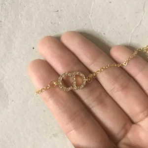 Alternative view of Linked chain Gold bracelet with pearls and diamonds inlaid and CD cut out.