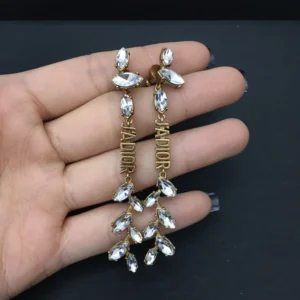 Alternative view of Dangle earrings with gems and diamonds J@D!0r cut out.