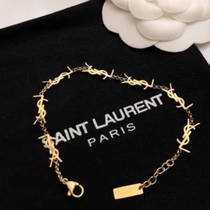 Golden linked chain bracelet with Y$L branding 18K gold plated.