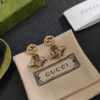 Golden Bee drop earrings with diamonds inlaid, giving a antique touch.