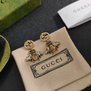 Golden Bee drop earrings with diamonds inlaid, giving a antique touch.