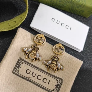Alternative view of Golden Bee drop earrings with diamonds inlaid, giving a antique touch.