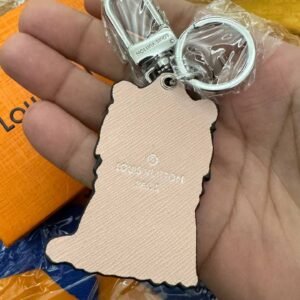 Alternative view of Cute rubber Tiger keyring in silver hardware.
