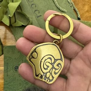 Cute golden keychain GG.