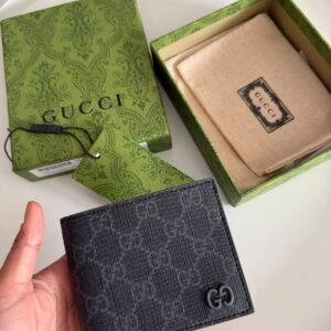 GG Signature Leather Bi-Fold Wallet with the metal Interlocking GG logo.